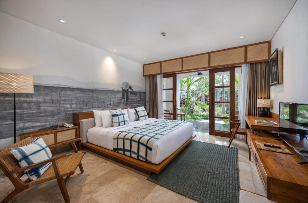 Postel nebo postele na pokoji v ubytování Dinara Ubud