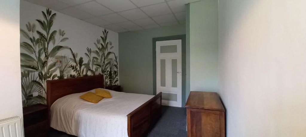 Кровать или кровати в номере Le green