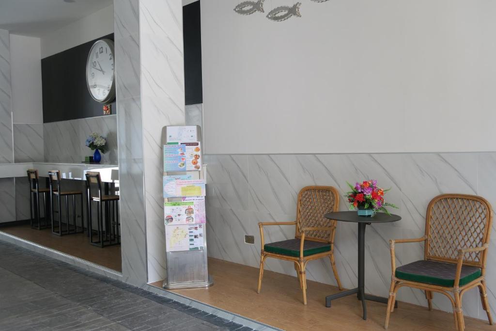 TV a/nebo společenská místnost v ubytování The Mira Hotel Chiang Rai