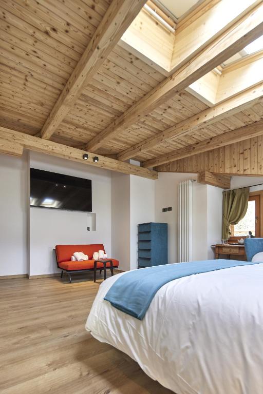 Postel nebo postele na pokoji v ubytování Locanda Boton D'Oro