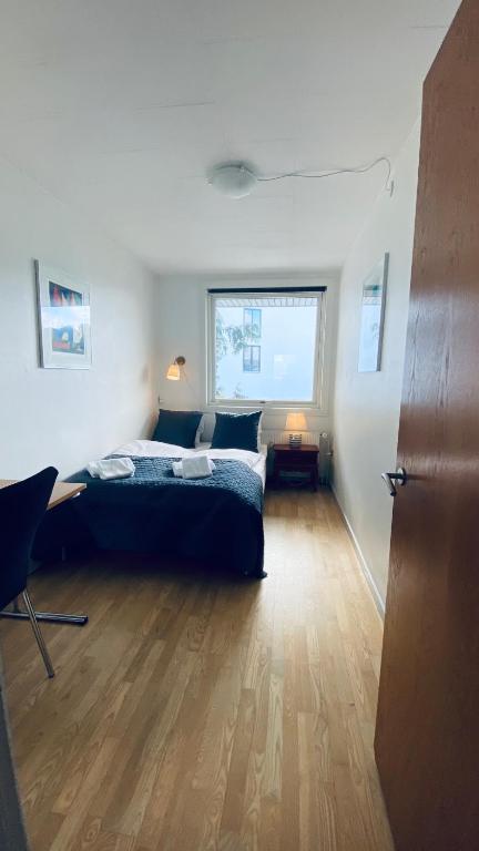 Postel nebo postele na pokoji v ubytování Søpark Apartments