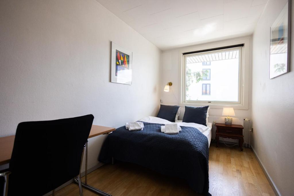 Postel nebo postele na pokoji v ubytování Søpark Apartments