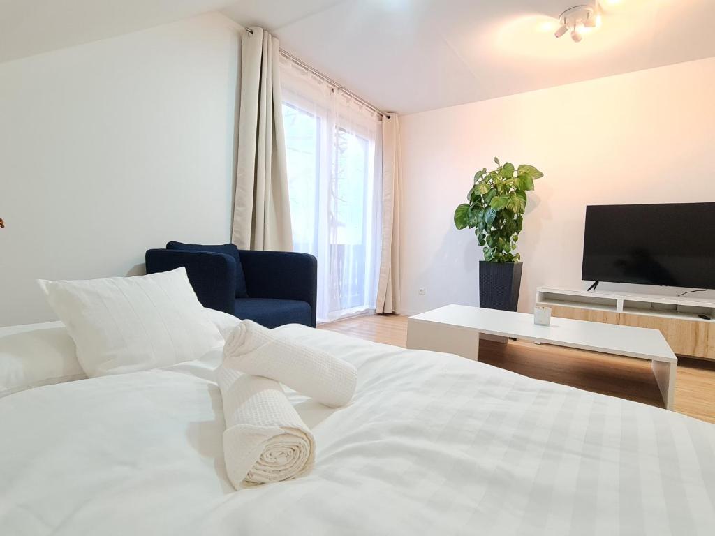 Postel nebo postele na pokoji v ubytování Apartment Nähe Airbus