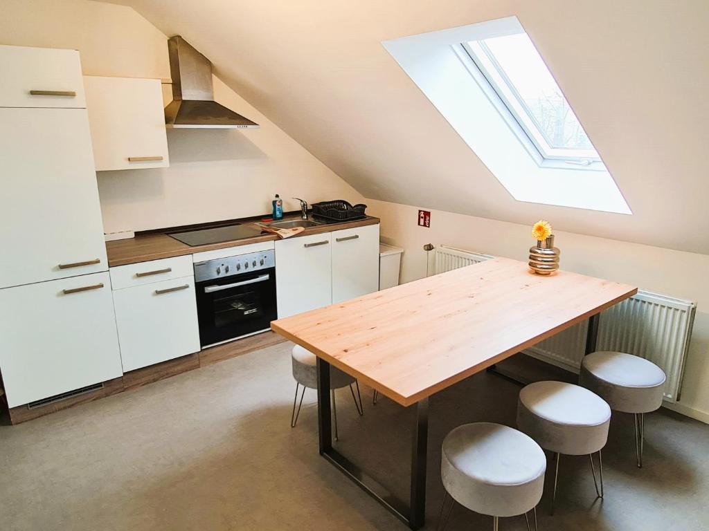 Kuchyň nebo kuchyňský kout v ubytování Apartment Nähe Airbus