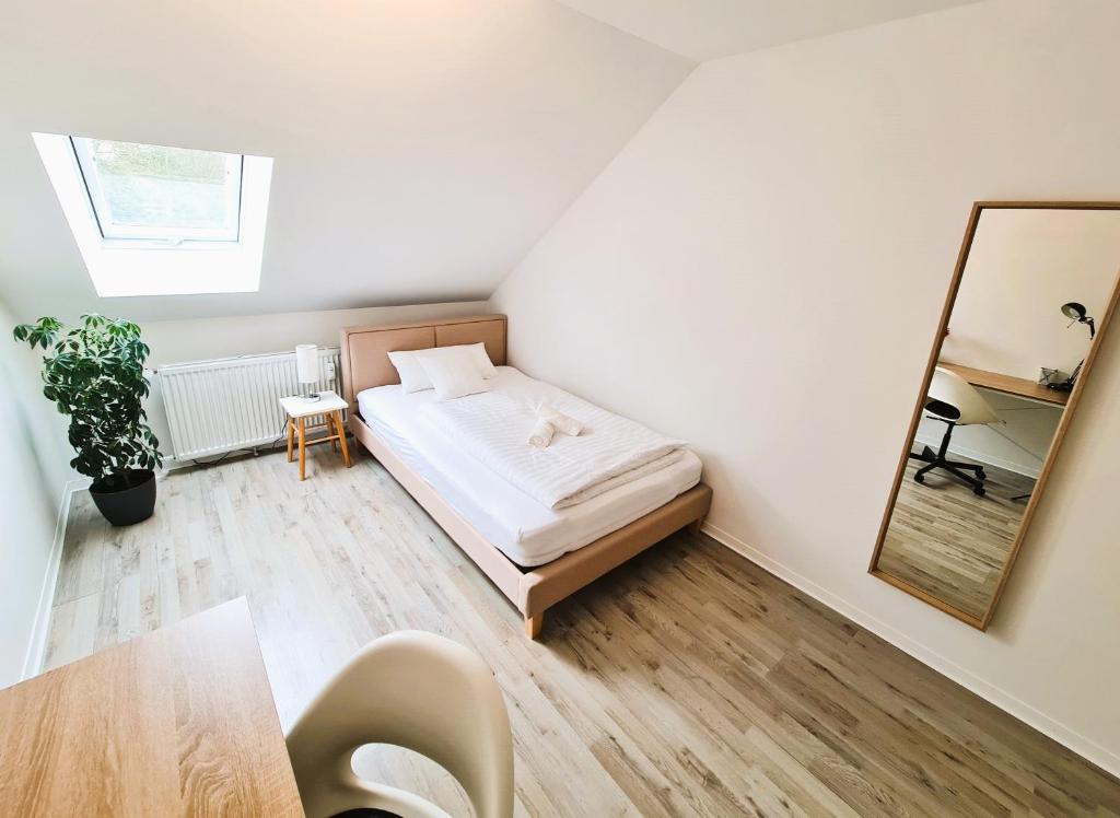 Postel nebo postele na pokoji v ubytování Apartment Nähe Airbus