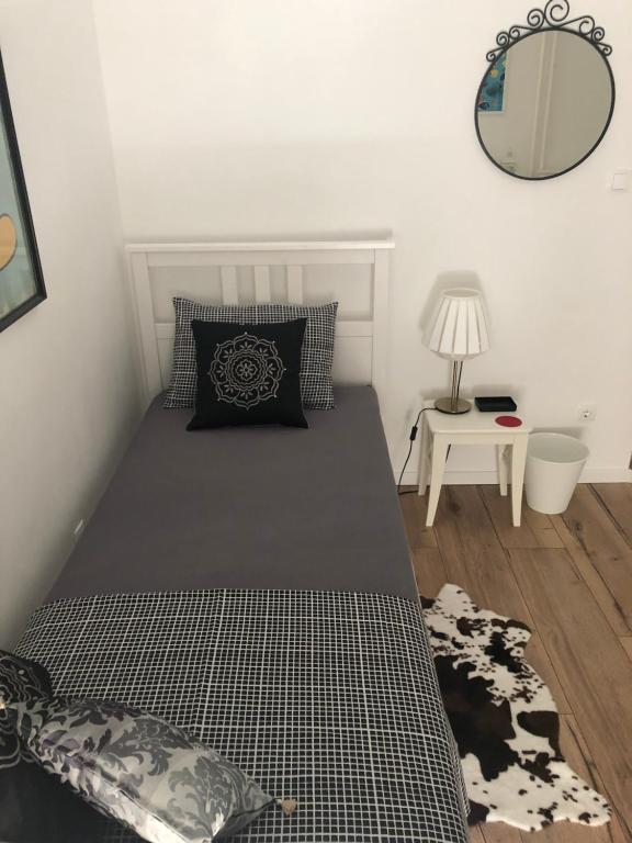 Posteľ alebo postele v izbe v ubytovaní Apartment ARGO