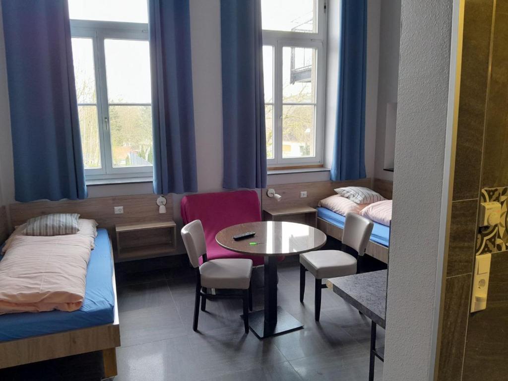 Zona de estar de Hotel-Pension Schlafpunkt in Solingen