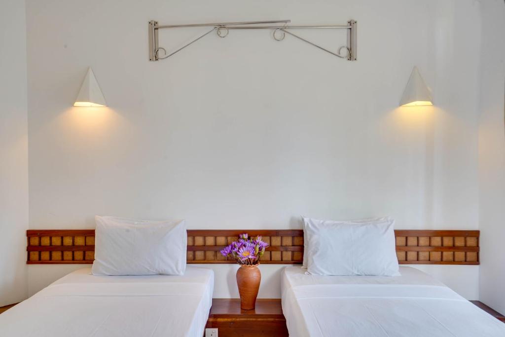 Postel nebo postele na pokoji v ubytování AIDA Hotel - Bentota