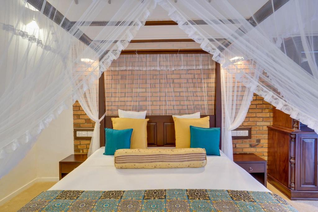 Postel nebo postele na pokoji v ubytování AIDA Hotel - Bentota