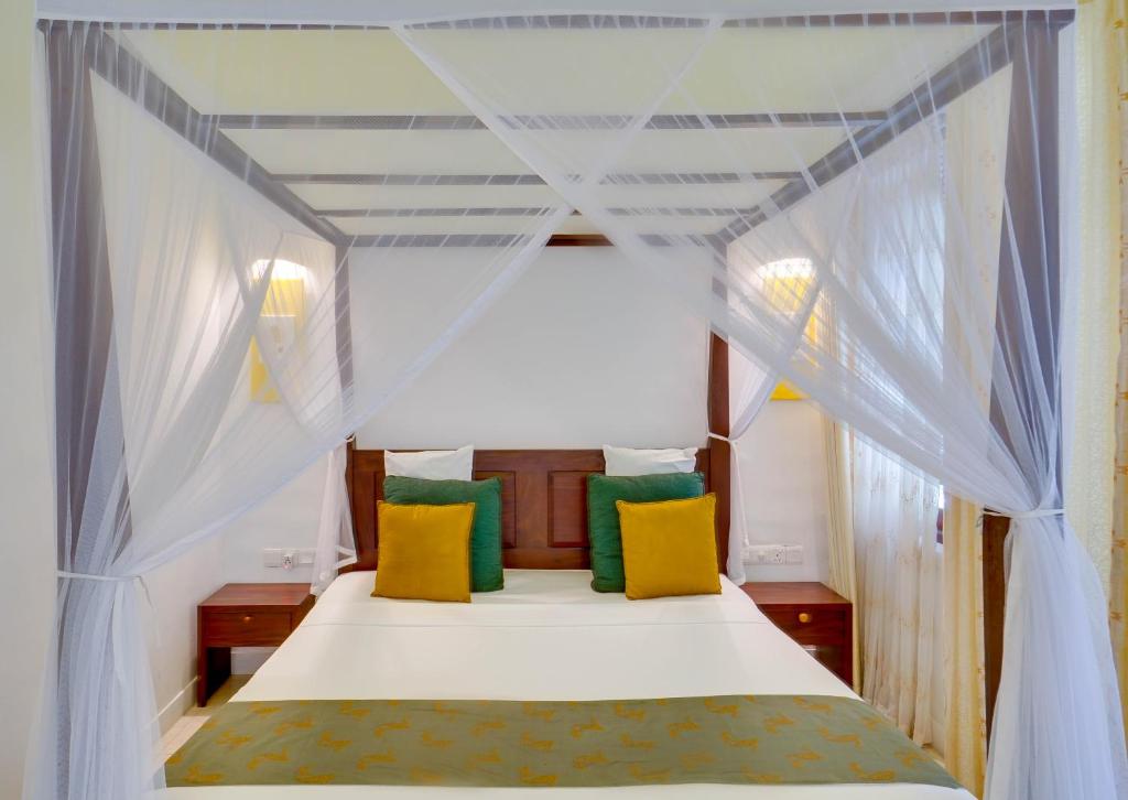 Postel nebo postele na pokoji v ubytování AIDA Hotel - Bentota