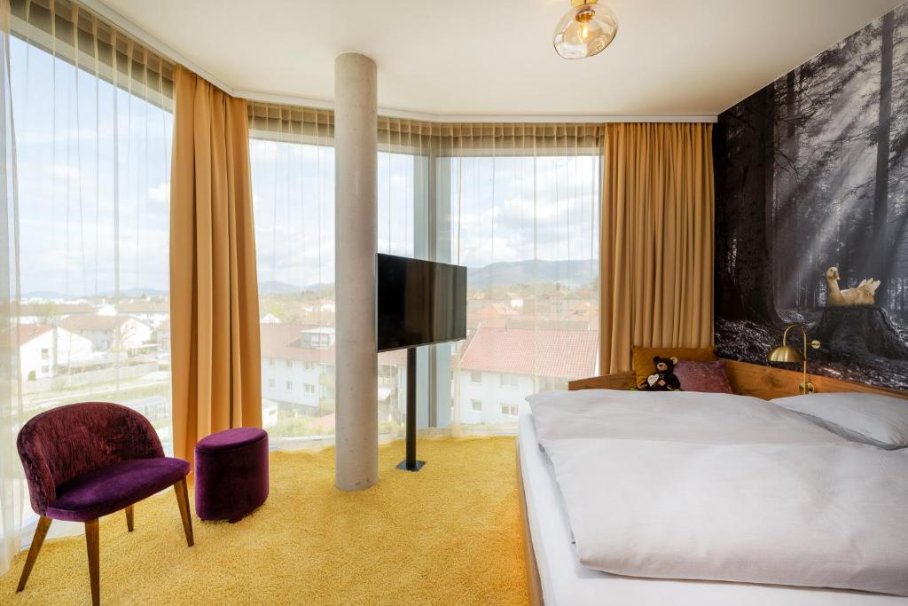 Postel nebo postele na pokoji v ubytování mightyTwice Hotel Achern