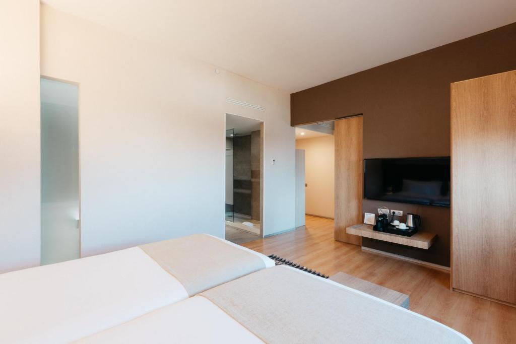 Postel nebo postele na pokoji v ubytování Barceló Valencia