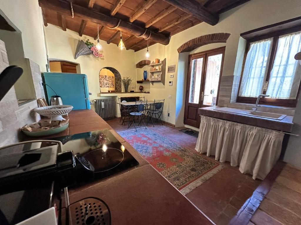 Kuchyň nebo kuchyňský kout v ubytování Agriturismo Tassinaia