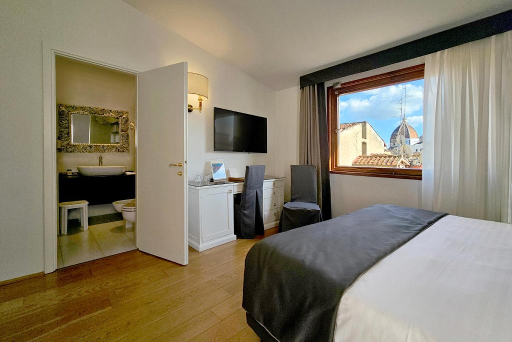 Postel nebo postele na pokoji v ubytování Hotel Atlantic Palace