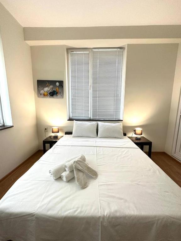 Llit o llits en una habitació de Guest House Memo at the center of kutaisi