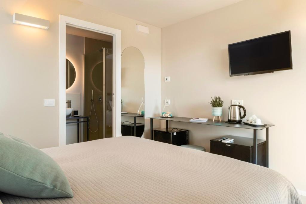 Posteľ alebo postele v izbe v ubytovaní bed&breakfast Filomare