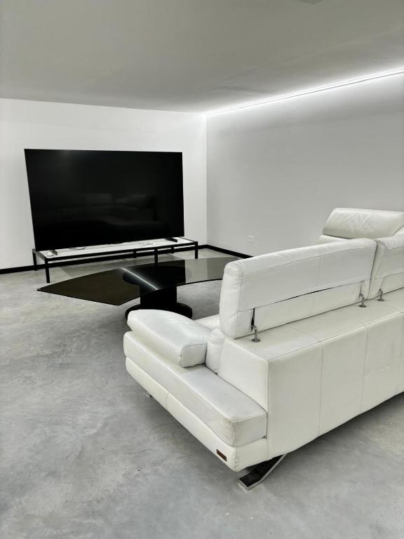 TV a/nebo společenská místnost v ubytování CASA DI GIULIETTA