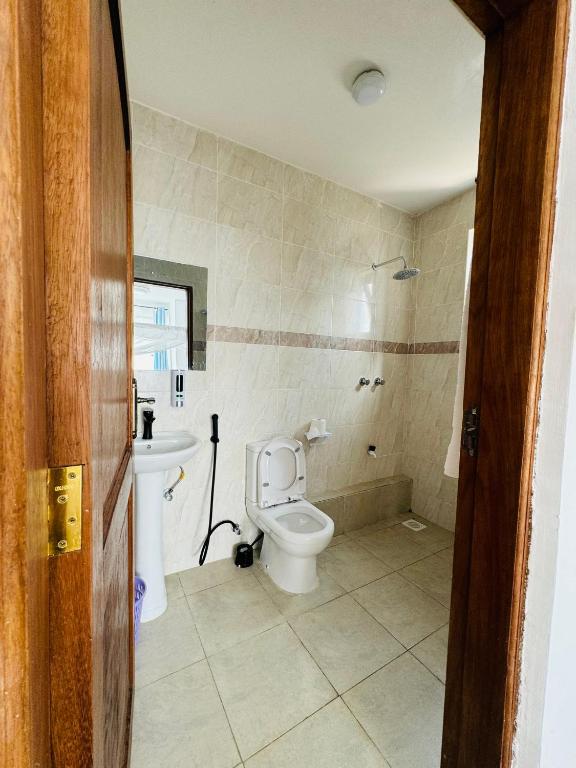 Koupelna v ubytování Tulivu Suites Diani