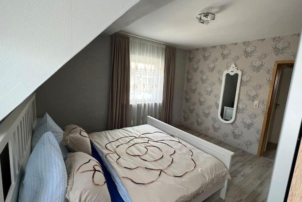 Ліжко або ліжка в номері Wohnung in BadKissingen