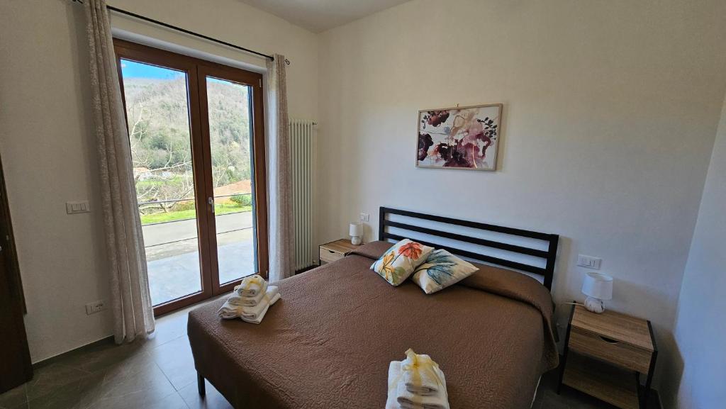 Postel nebo postele na pokoji v ubytování Il sogno di Gaggiuin