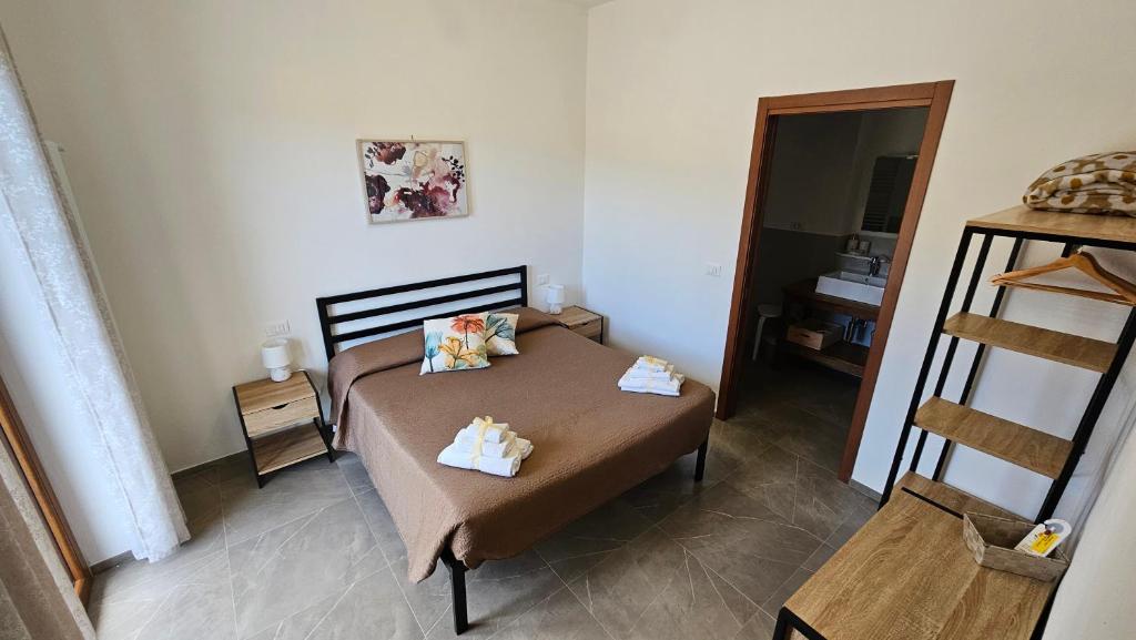 Postel nebo postele na pokoji v ubytování Il sogno di Gaggiuin