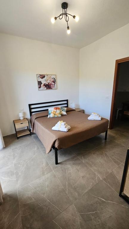 Postel nebo postele na pokoji v ubytování Il sogno di Gaggiuin