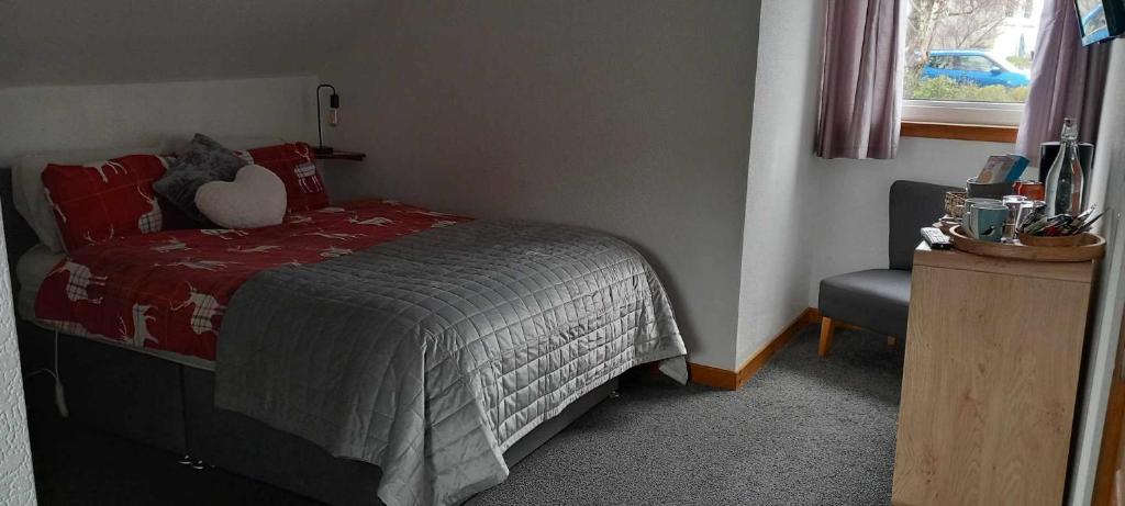 Postel nebo postele na pokoji v ubytování Don Muir Guesthouse