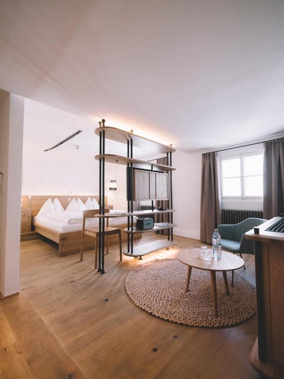 Posteľ alebo postele v izbe v ubytovaní artHotel Blaue Gans
