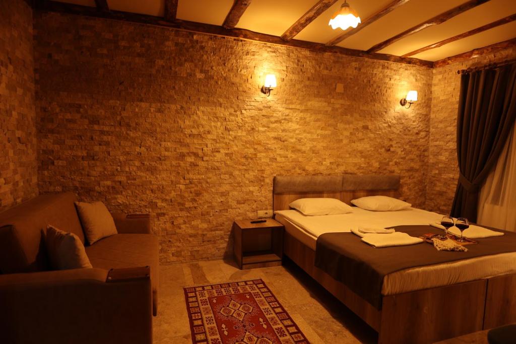 Postel nebo postele na pokoji v ubytování Calina Capadocia