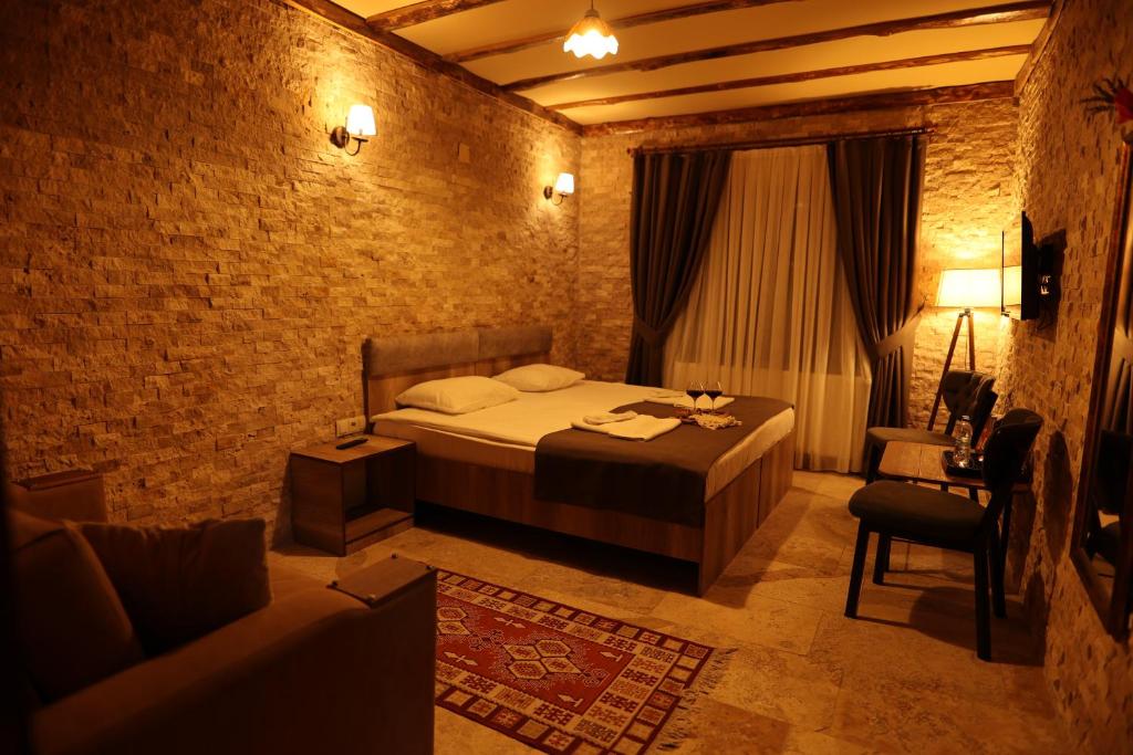 Postel nebo postele na pokoji v ubytování Calina Capadocia