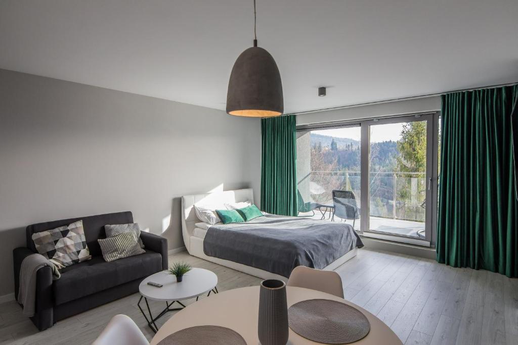 Posezení v ubytování Apartview Bukowa II by Rent like home