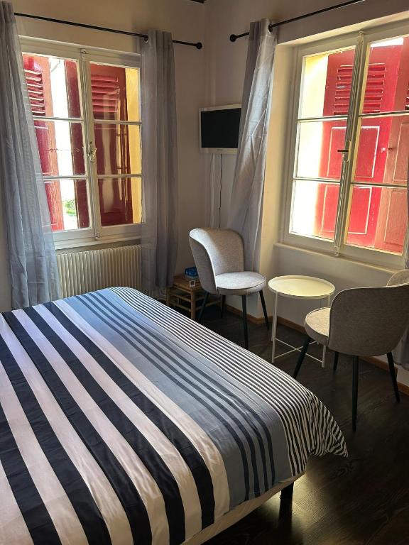 Postel nebo postele na pokoji v ubytování Chambres d'Hôtes Le Felseneck