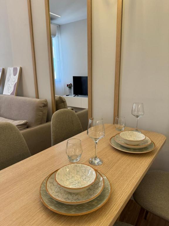 Un televizor și/sau centru de divertisment la Nomad Stay Apartments