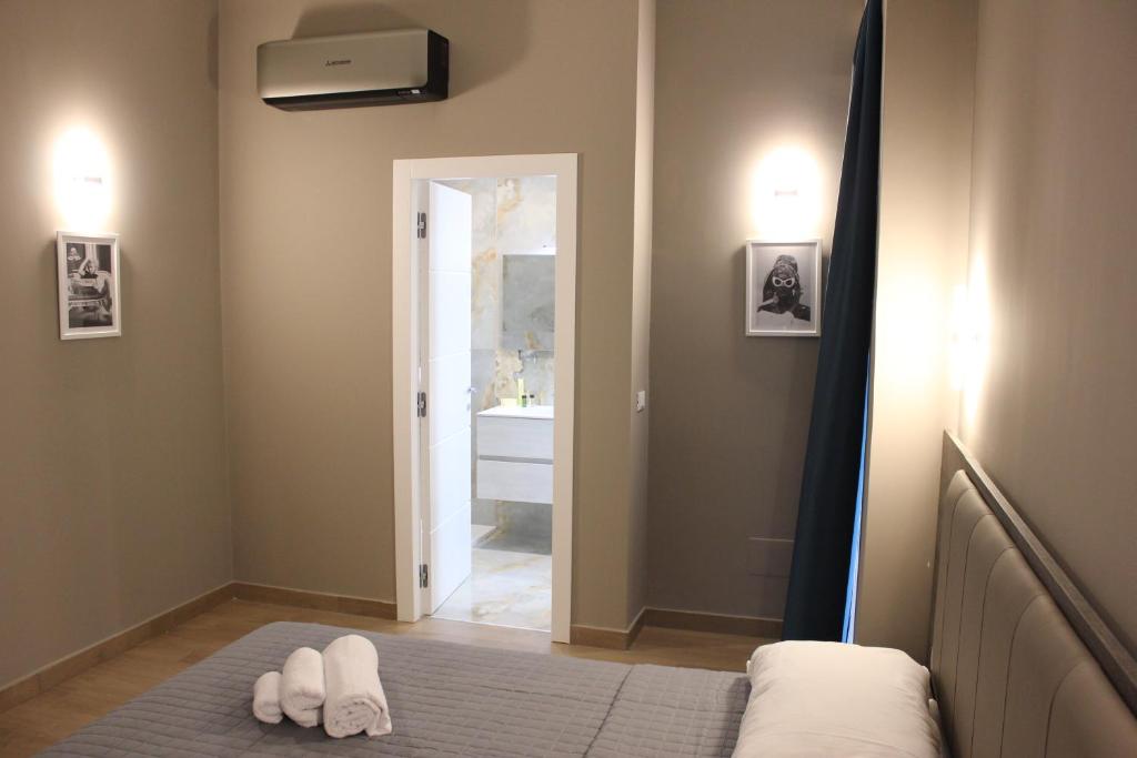 Postel nebo postele na pokoji v ubytování Sunset Guest House