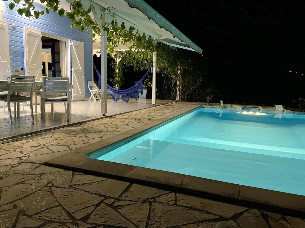 Bazén v ubytování Villa en bord de mer à Saint-Pierre, 100 m² nebo v jeho okolí