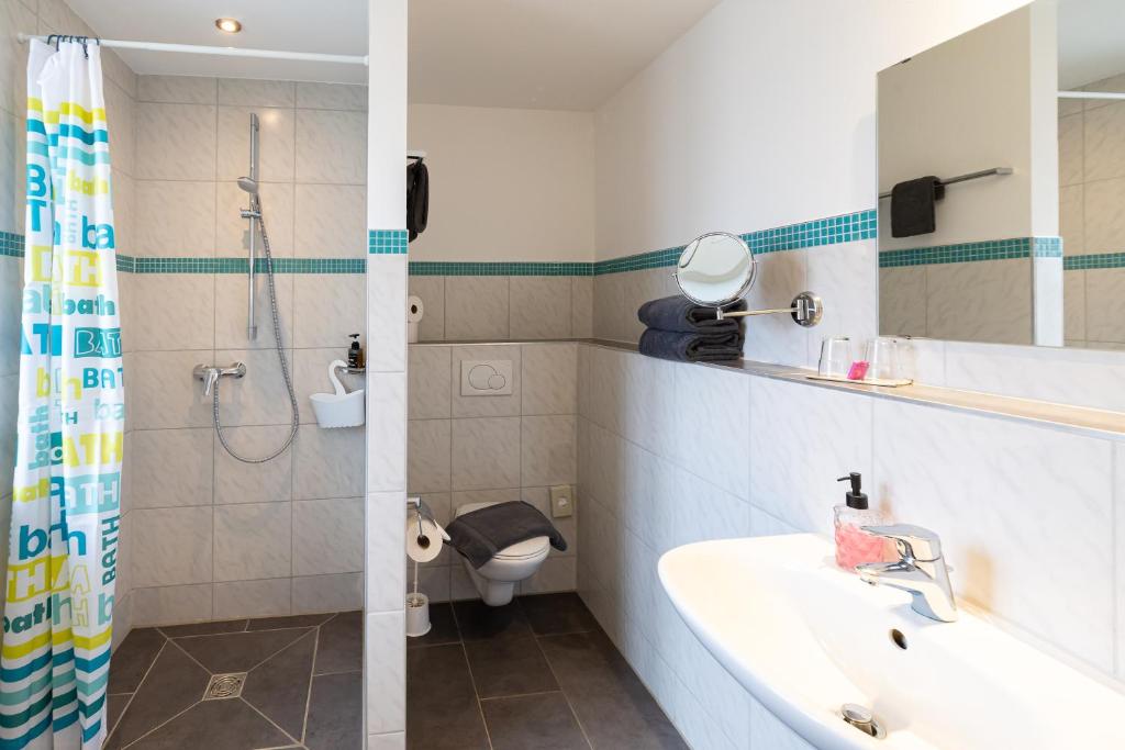 Koupelna v ubytování Hotel DAH-Inn