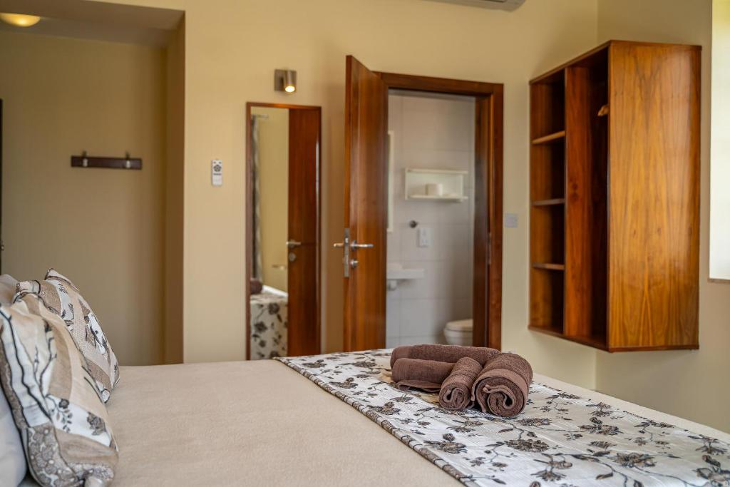 Postel nebo postele na pokoji v ubytování Il-Logga Boutique Hotel
