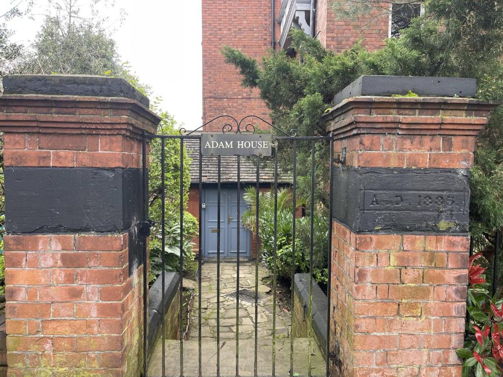 an entrance to a house with a wrought iron gate at 1 bed apartment in the park a quiet enclave in Nottingham