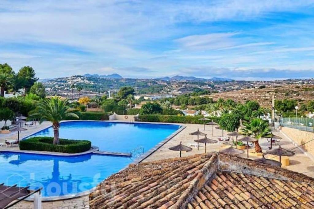 an image of a swimming pool at a resort at Casa Tere in Benitachell