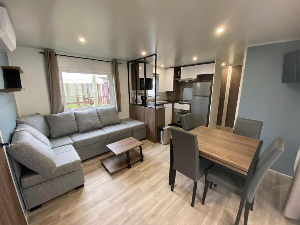 Posedenie v ubytovaní Mobil home familial neuf de 2024 pour 8 personnes
