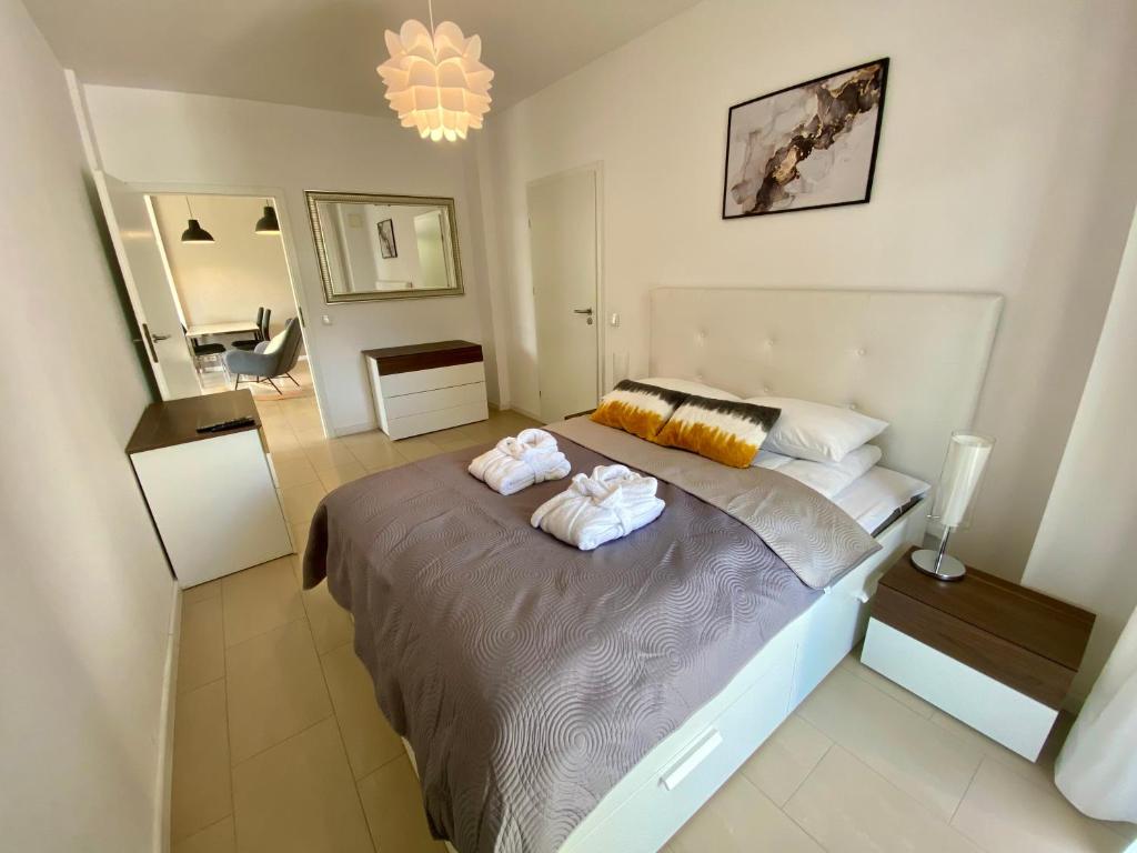 Postel nebo postele na pokoji v ubytování Apartview Bukowa II by Rent like home