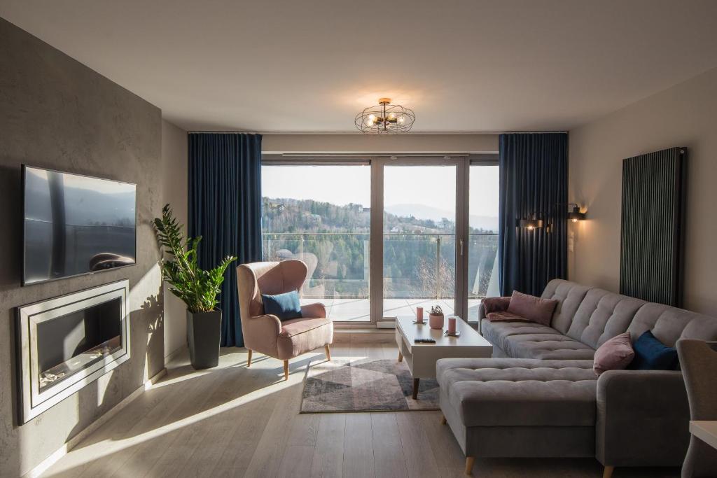 TV a/nebo společenská místnost v ubytování Apartview Bukowa II by Rent like home