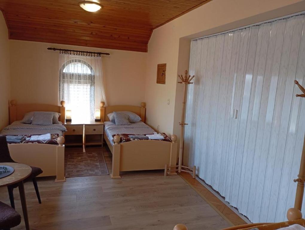 Postel nebo postele na pokoji v ubytování Apartman Sekulić