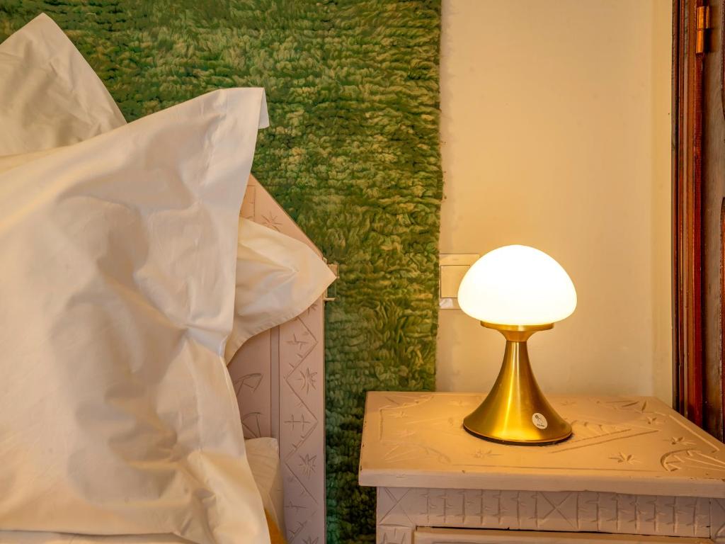 Postel nebo postele na pokoji v ubytování Kilimini Riad & SPA
