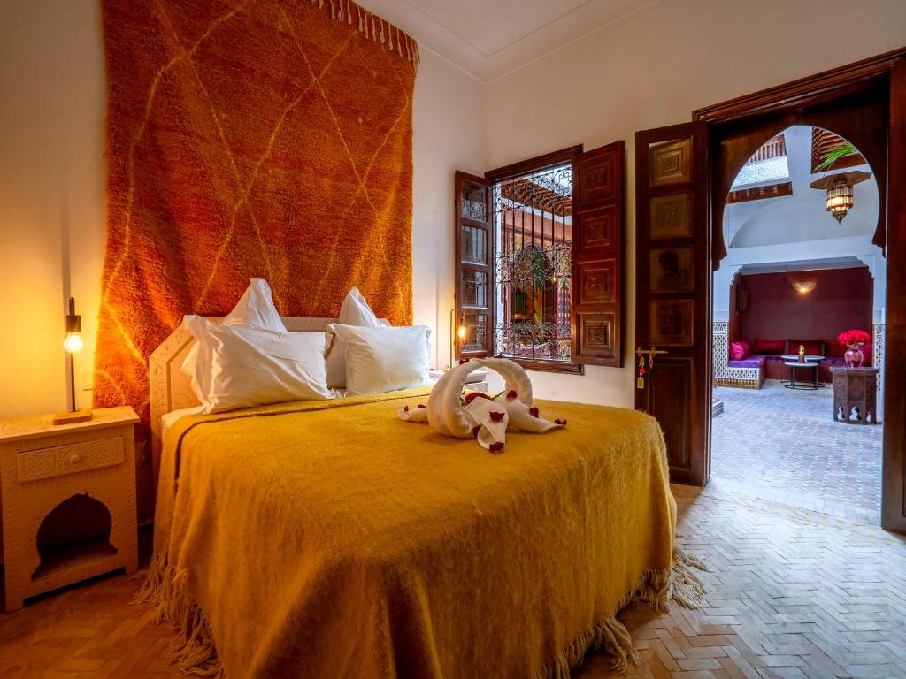 Postel nebo postele na pokoji v ubytování Kilimini Riad & SPA