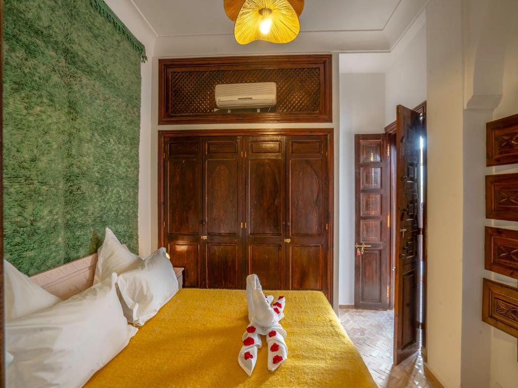 Postel nebo postele na pokoji v ubytování Kilimini Riad & SPA