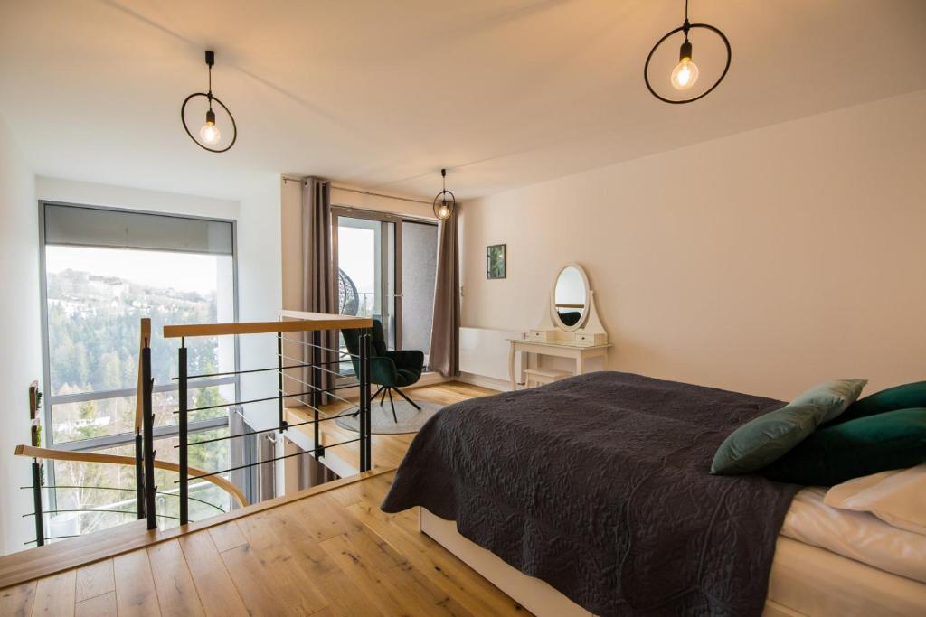 Postel nebo postele na pokoji v ubytování Apartview Bukowa II by Rent like home