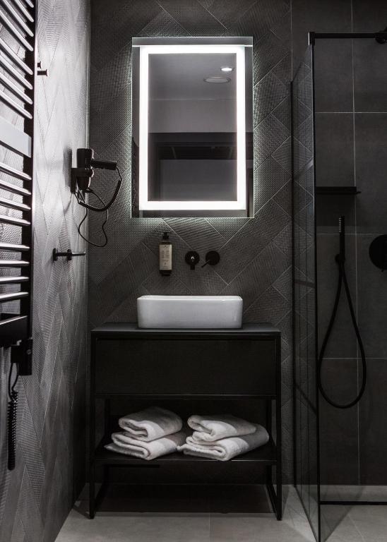 Koupelna v ubytování Hotel M23