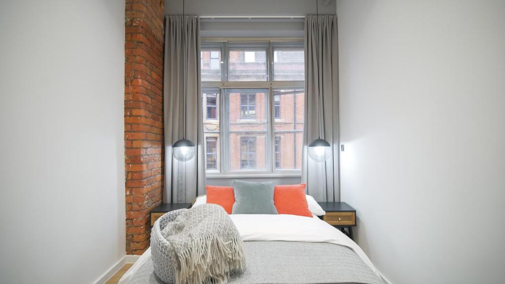 Postel nebo postele na pokoji v ubytování Chicago by The Heim Residences