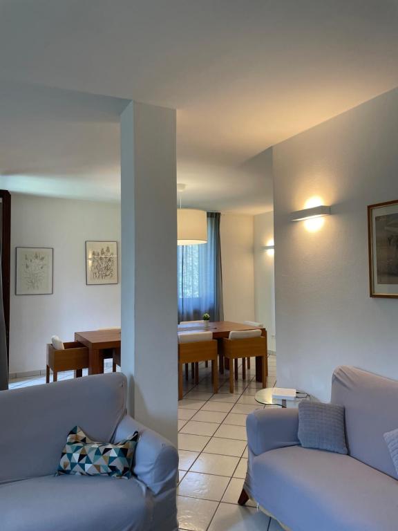 A seating area at Bnbook Villa Biancospino